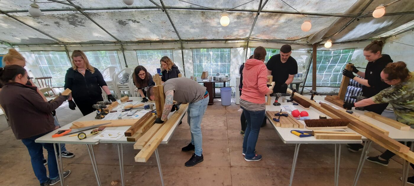 Corporate team building at Lakeview Monkey Sanctuary in Ascot, set within a private 10‑acre woodland supporting rescued primates and CSR impact. Team working together in the woodland at Lakeview Monkey Sanctuary, creating ethical CSR outcomes through hands‑on conservation activities near Ascot. Scenic woodland at Lakeview Monkey Sanctuary in Ascot, home to rescued monkeys and lemurs and used for immersive CSR team‑building experiences