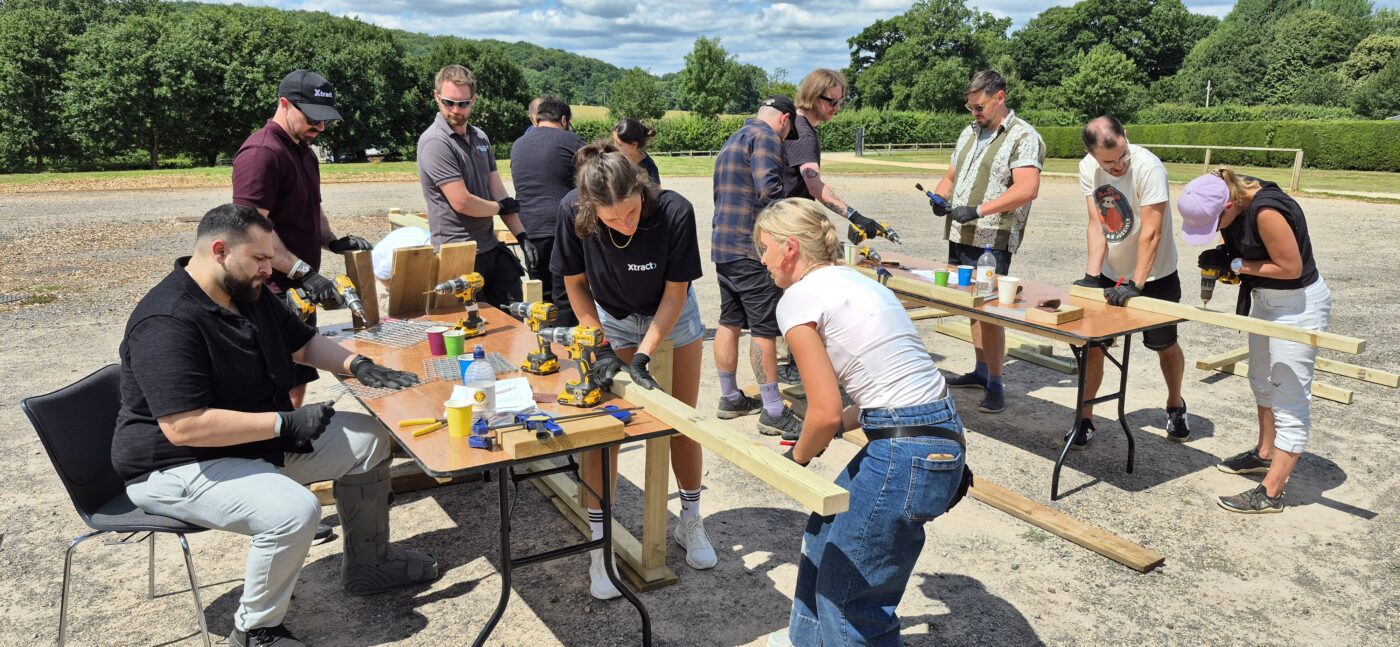Employees taking part in a CSR‑focused team building experience at Longleat, contributing to wildlife conservation and environmental stewardship within the safari park.