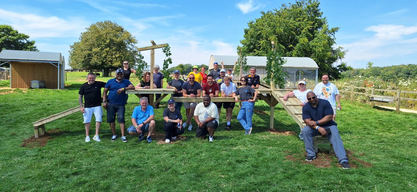 Corporate team taking part in a CSR team‑building event at Cotswold Farm Park Employees collaborating on hands‑on conservation activity at Cotswold Farm Park Team building enrichment items for Cotswold Farm Park animals during CSR workshop Purpose‑driven team‑building day supporting animal welfare at Cotswold Farm Park Staff working together on meaningful CSR activity in the Cotswolds